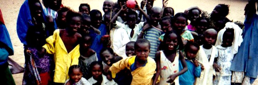 Children gathered in a village in Senegal